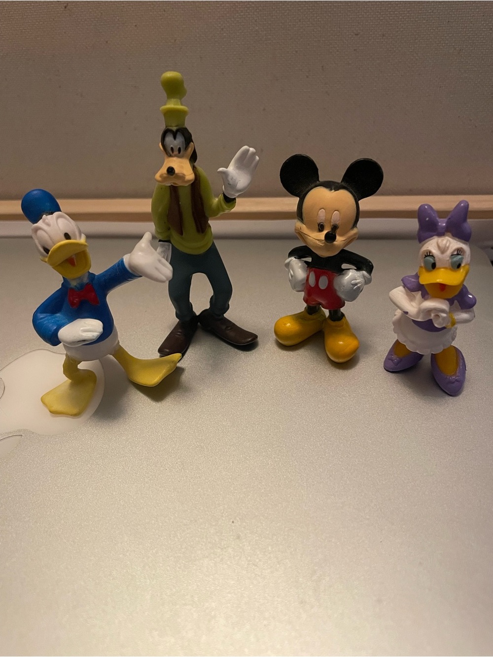 Disney character friends Mickey Goofy Donald and Daisy Duck figurines vintage